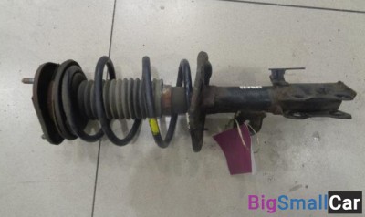 Амортизатор передний левый от Toyota Corolla E150 2006-2013